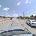 Abandoned vehicle left partly in roadway