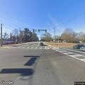 Crash with vehicle smoke and leg injury reported