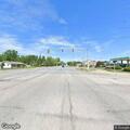 Stalled car blocking lane near Center Street store