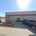 Female with breathing difficulty in red Kia minivan