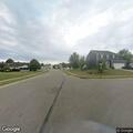 Driver reports damage after hitting pole