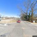 Traffic stop involving blue Mazda sedan