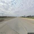 Pedestrian walking in US 59 express lanes