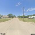 Power poles reported smoking at 11th and Kansas
