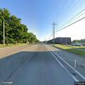 Two-car crash blocking road with possible injuries