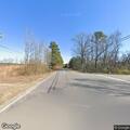 Woman struck by vehicle at rural intersection