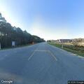 Male leaning over bridge at NC Highway 172
