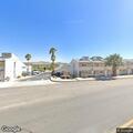 Person suffering severe back pain in Yucca Valley