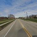 Vehicle reported running stop signs on Spring Street