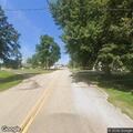 Vehicle pulls down smoking power lines by church