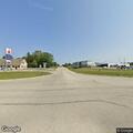 Vehicle hits power pole, lines down on highway