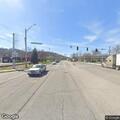 Officer monitoring vehicle near highway junction