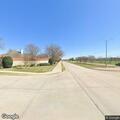 Suspicious vehicle left in field near neighborhood