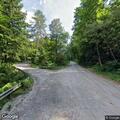 Tree down with wires blocking Cornish roadway