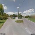 Abandoned car found near mile marker sign