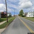 Tree blocking roadway on Route 66 near Kane