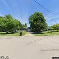 Warrant service on man riding lawnmower