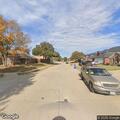 Officer detains person at Angelman and Winston