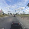Patient receives oxygen after medical call at highway intersection