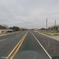 Loose calf running along Highway 183 near Mullin