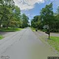 Line on fire near porch at Greenwood Avenue home