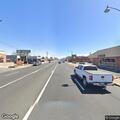 Traffic stop on dark Nissan Rogue on Oak Street