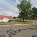 Minor two-vehicle crash by high school on Broadway