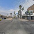 Person sitting on train tracks at 4th and Long Beach