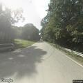 Car hits guardrail with driver trapped inside