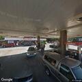 Vehicle grazes lawn and leaves scene