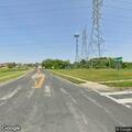 Officer traffic stop on silver Chevy Spark