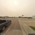 Suspicious person and truck circling motel parking lot