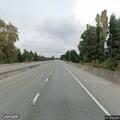Disabled vehicle on highway with person asleep