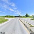 Trash truck dropping cardboard on Route 207