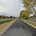 Motorcycle and vehicle crash with injured rider