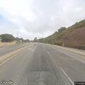 Person experiencing chest pain at intersection