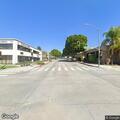 Person experiencing chest pain at bus stop in Whittier