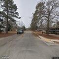 Caller reports conflict with adult child at home
