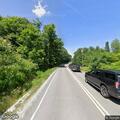 Tree on power lines causes roadside fire in Wilton