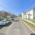 Officer checks male behind Barry Street home