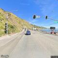 Driver uses sidewalk to pass cars on Pacific Coast Hwy