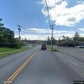 Three juveniles lying near road by high school