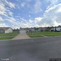 Aggressive dog traps man in car on Red Oak Lane