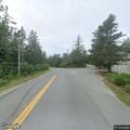 Fallen tree blocks traffic on Sunset Road in Deer Isle