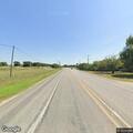 Illegal trash fire near State Highway 171