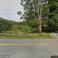 Report of skinny horse ridden in roadway