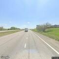 Pedestrian walking on shoulder of I-29 southbound