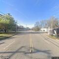 Tree down on power lines blocking roadway