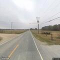 Rekindled fire near Church Road threatens camper