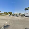 Person panhandling in roadway at intersection